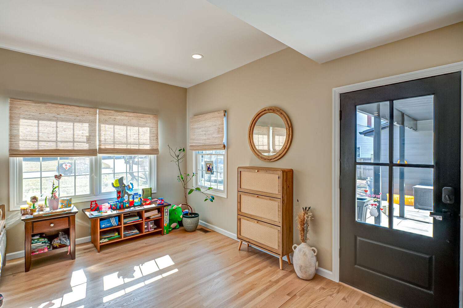 Bright playroom and entry space in a custom home by Long Island Creative Contracting, Inc. in Miller Place, NY
