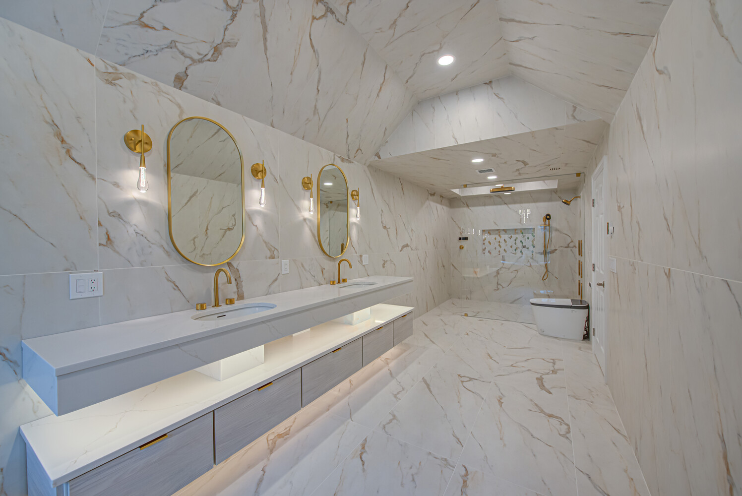 Large modern bathroom featuring floating vanity and open shower by Long Island Creative Contracting, Inc. in Mount Sinai, NY