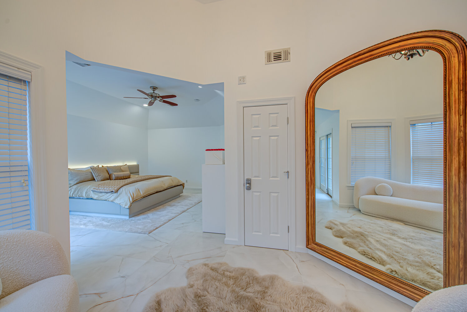 Transitional view from sitting room to custom master bedroom in Stony Brook, NY by Long Island Creative Contracting, Inc
