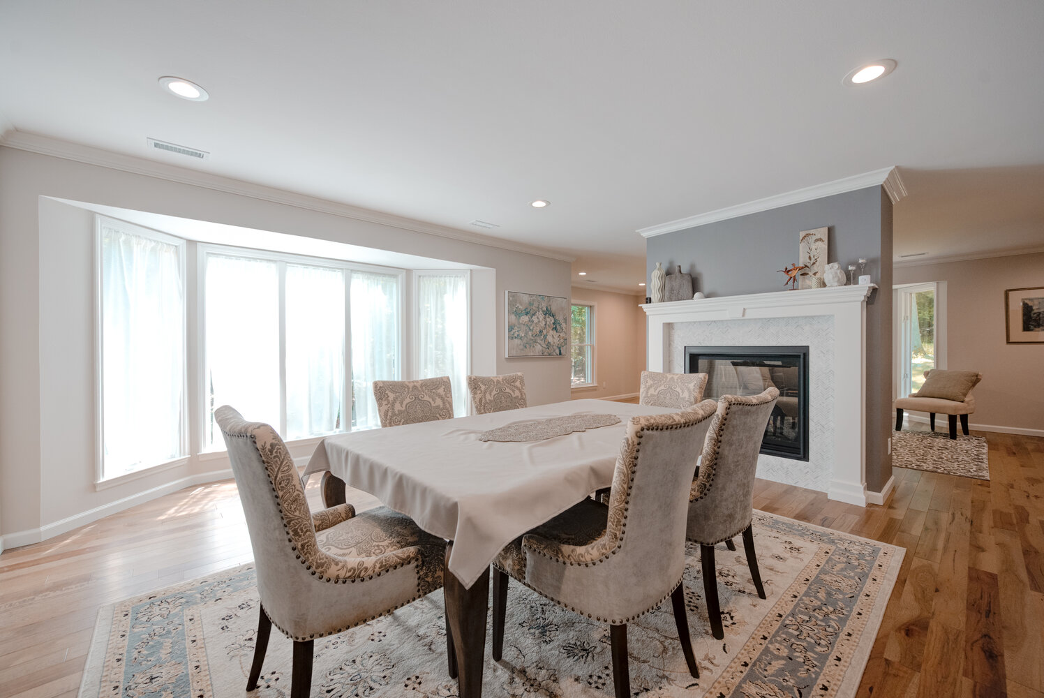 Elegant dining room in a custom home build by Long Island Creative Contracting, Inc. in Miller Place, NY