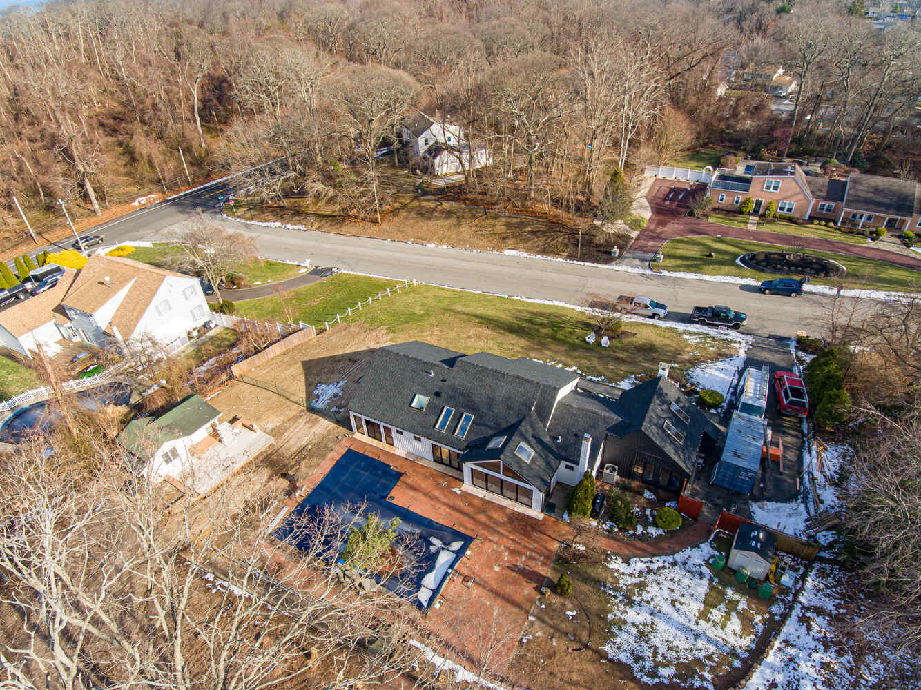 Overhead view of completed custom home and surrounding neighborhood in Miller Place, NY
