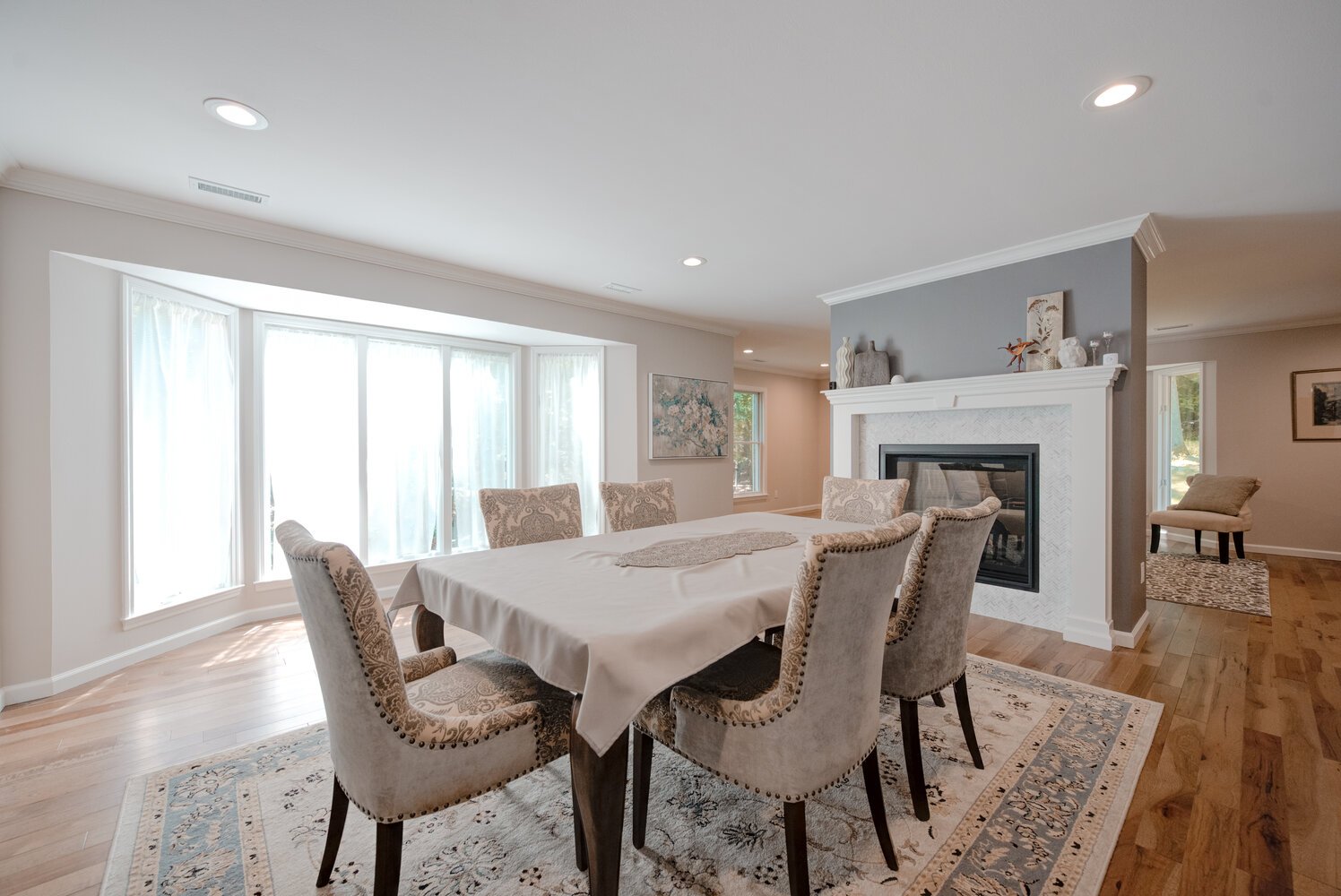 Elegant dining room in a custom home build by Long Island Creative Contracting, Inc. in Miller Place, NY